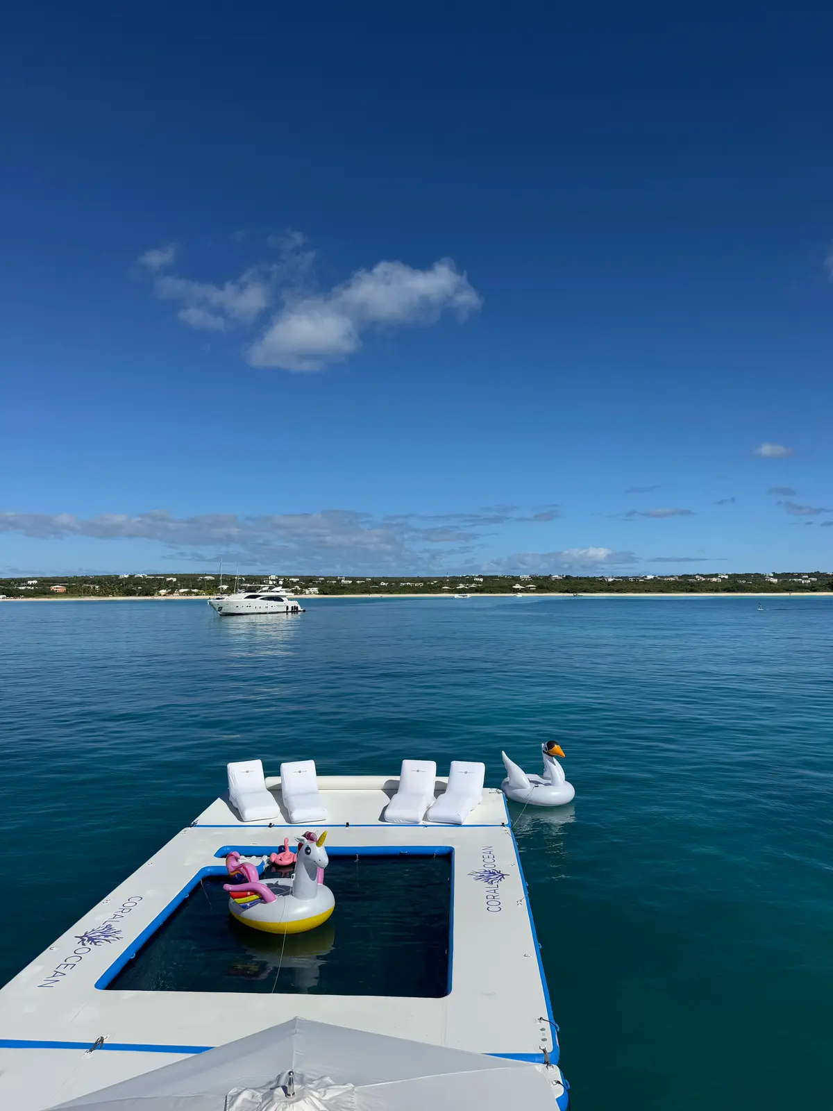 The yacht's sea pool and inflatables off Anguilla
