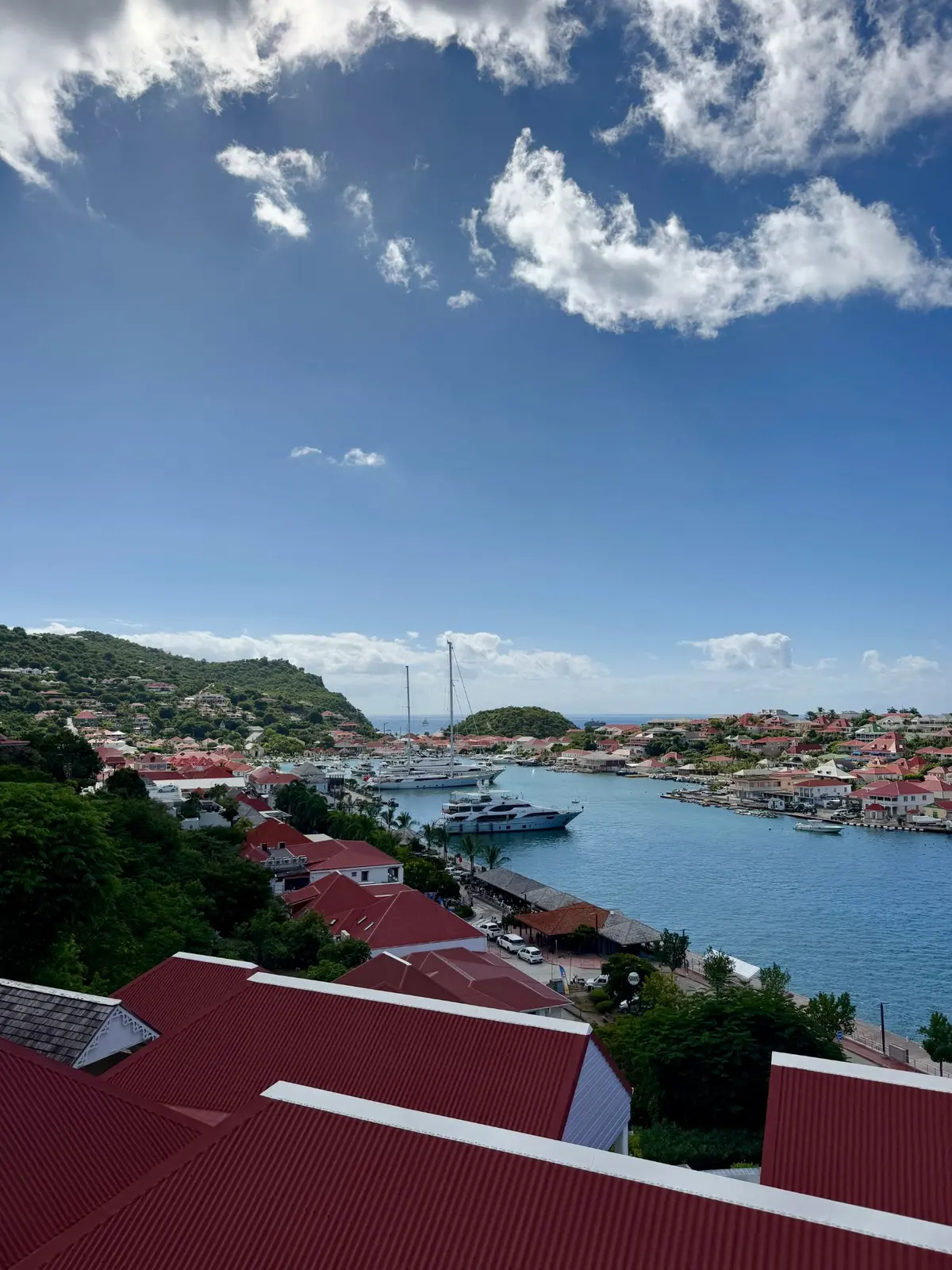 Gustavia harbour from the hill, red roofs and yachts at anchor